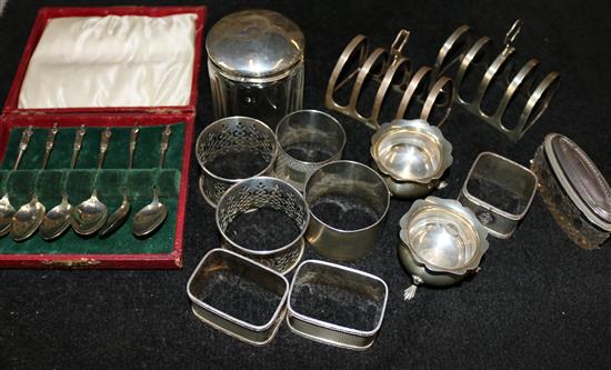 Collection of silver napkin rings, 2 toast racks, salts etc